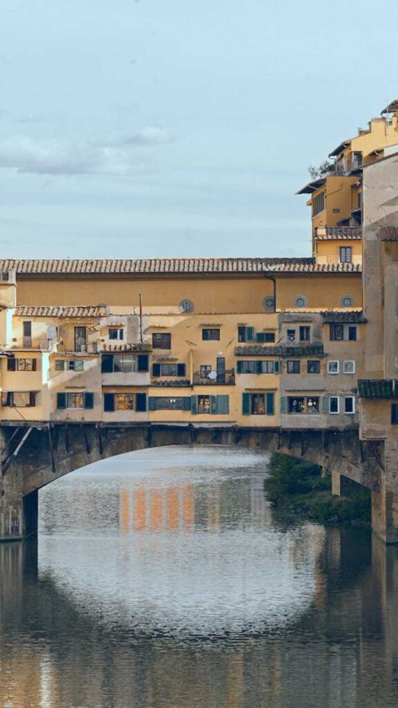 Historic Ponte Vecchio bridge over the Arno River in Florence, Italy