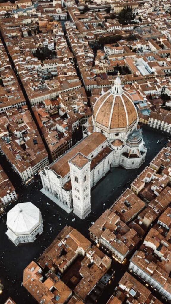 Aerial view of Florence with the Cathedral of Santa Maria del Fiore and red-tiled rooftops